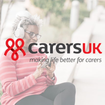 Carers UK logo over an image of a lady looking at a tablet wearing headphones