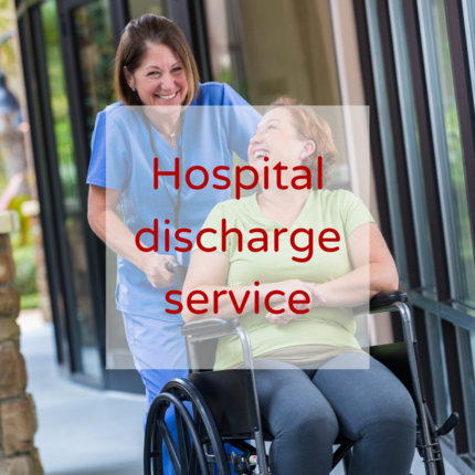 Lady in a wheelchair being pushed by a medical professional