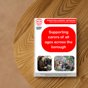 A picture of a brochure on a coffee table