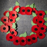 A wreath made from paper poppies