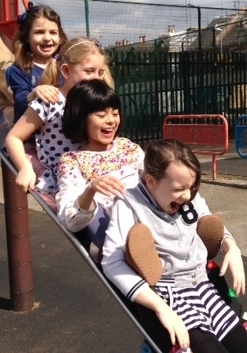 Young carers on slide